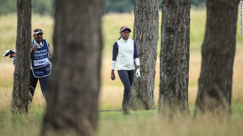 Oboh walks to her second shot on the second hole during the first round of the Aberdeen Standard Investments Ladies Scottish Open.