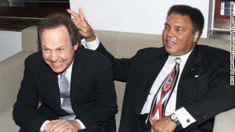 Billy Crystal and Muhammad Ali at the Audemars Piguet Time To Give Celebrity Watch Audemars Piguet charity auction at Christie's New York in 2000.