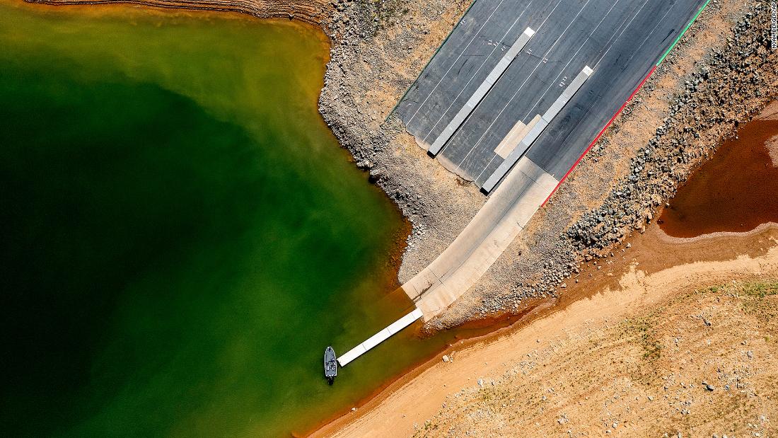 A launch ramp, extended to accommodate low water levels, stretches into California&#39;s Lake Oroville on May 22. At the time of this photo, the reservoir was at 39% of capacity and 46% of its historical average.