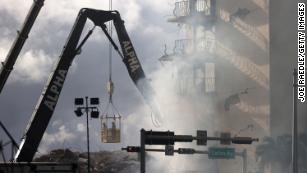 In pictures: The aftermath of the partial condo building collapse