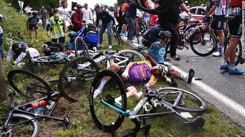 French authorities open investigation after Tour de France spectator causes massive crash