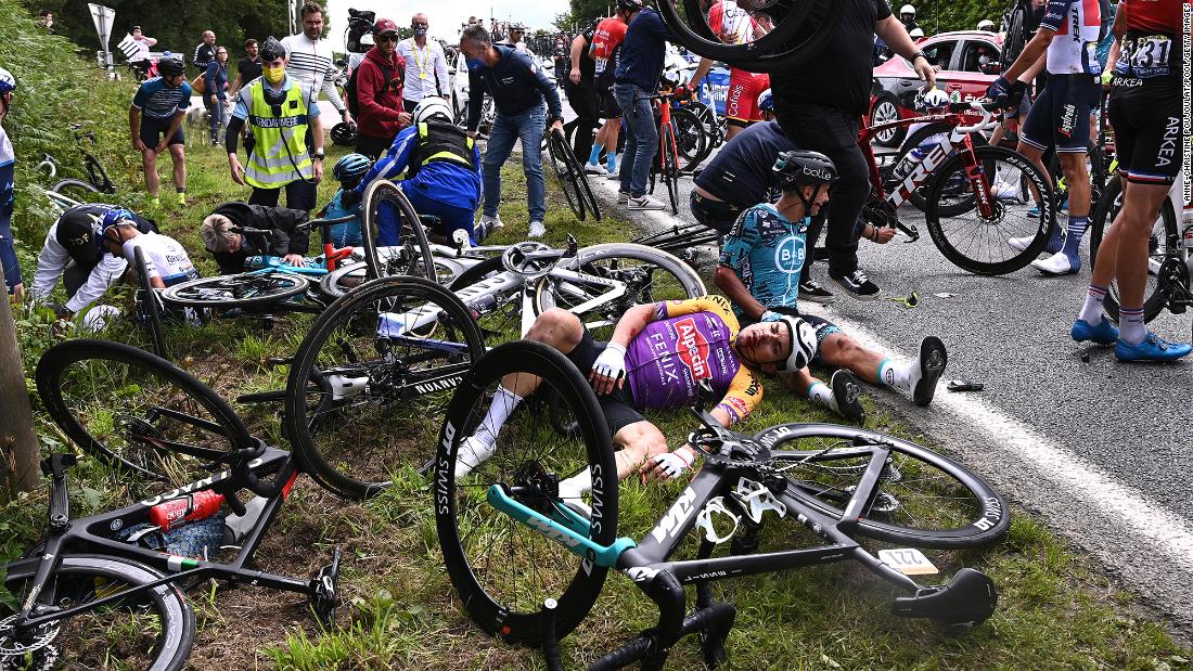  (CNN)French authorities have launched an investigation after a fan caused dozens of cyclists to crash during the Tour de France on Saturday.  (CNN)Fr