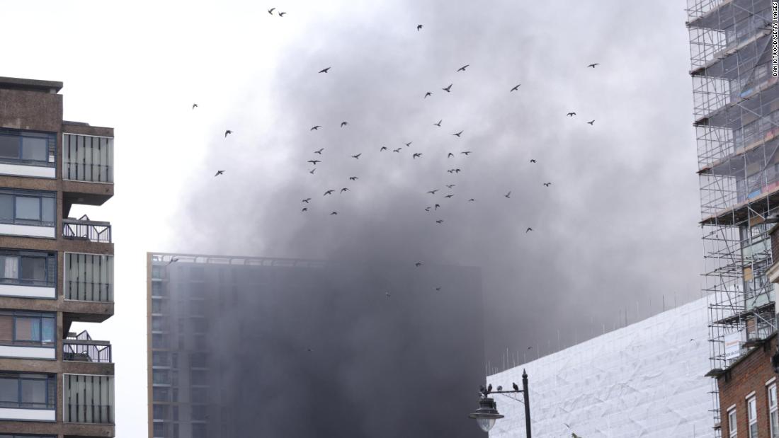 Smoke billows from London train station as fire crews ...