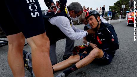 Geraint Thomas sits on the road after crashing during the third stage of the 108th edition of the Tour de France cycling race, 182 km between Lorient and Pontivy, on June 28, 2021.