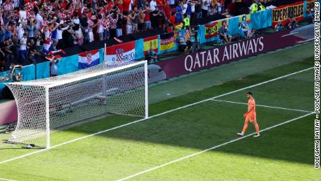 Unai Simon of Spain looks dejected after allowing Pedri&#39;s pass to bobble into the net.