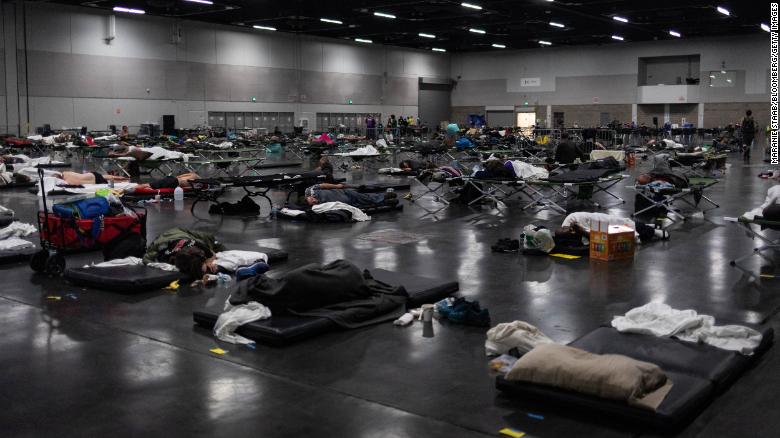 People take refuge at a cooling center in Portland on Monday.