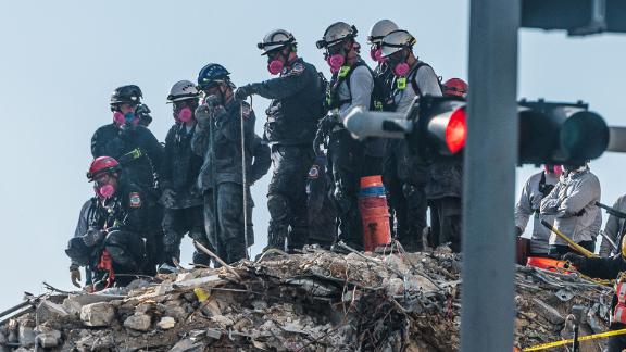 Search and Rescue teams look for possible survivors on June 28.