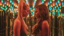 Riley Keough (left) stars as &quot;Stefani&quot; and Taylour Paige (right) stars as &quot;Zola&quot; in director Janicza Bravo&#39;s ZOLA, an A24 Films release. Cr. Anna Kooris/A24 Films