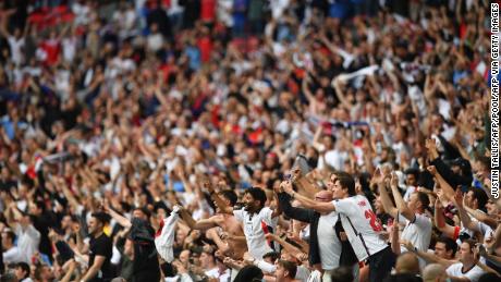 England supporters celebrate their victory in the UEFA Euro 2020 round of the 16 football tournament between England and Germany at Wembley Stadium.