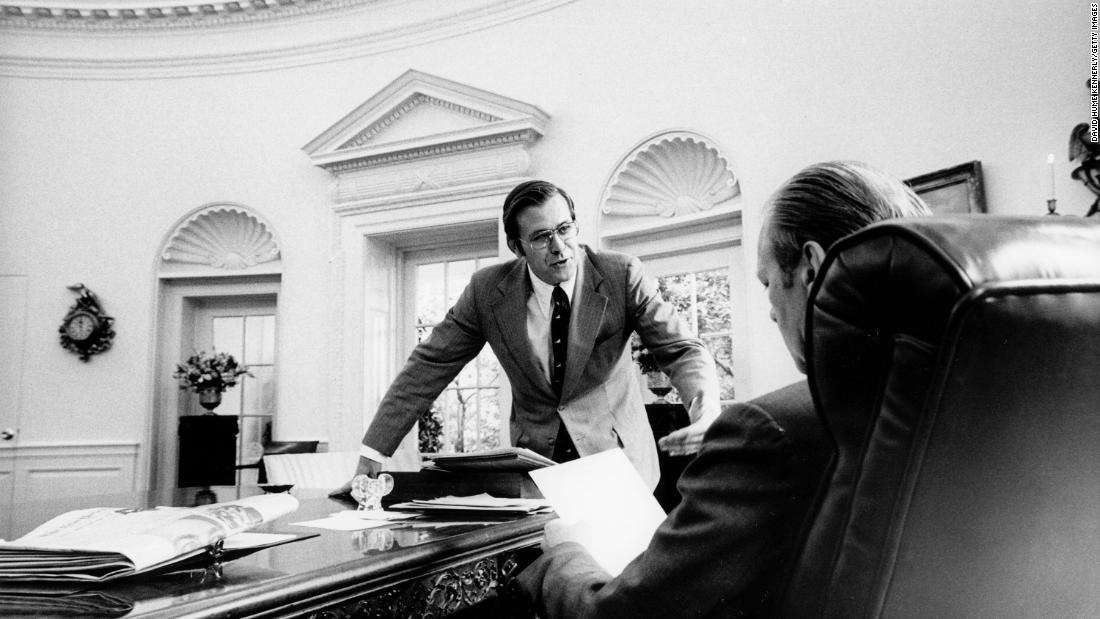 Rumsfeld speaks with Ford in the Oval Office circa 1975.