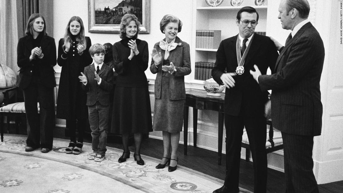 Rumsfeld receives the Presidential Medal of Freedom from Ford in January 1976. Joining them, from left, are Rumsfeld&#39;s children, Valerie, Marcy, and Nick; his wife, Joyce; and first lady Betty Ford.