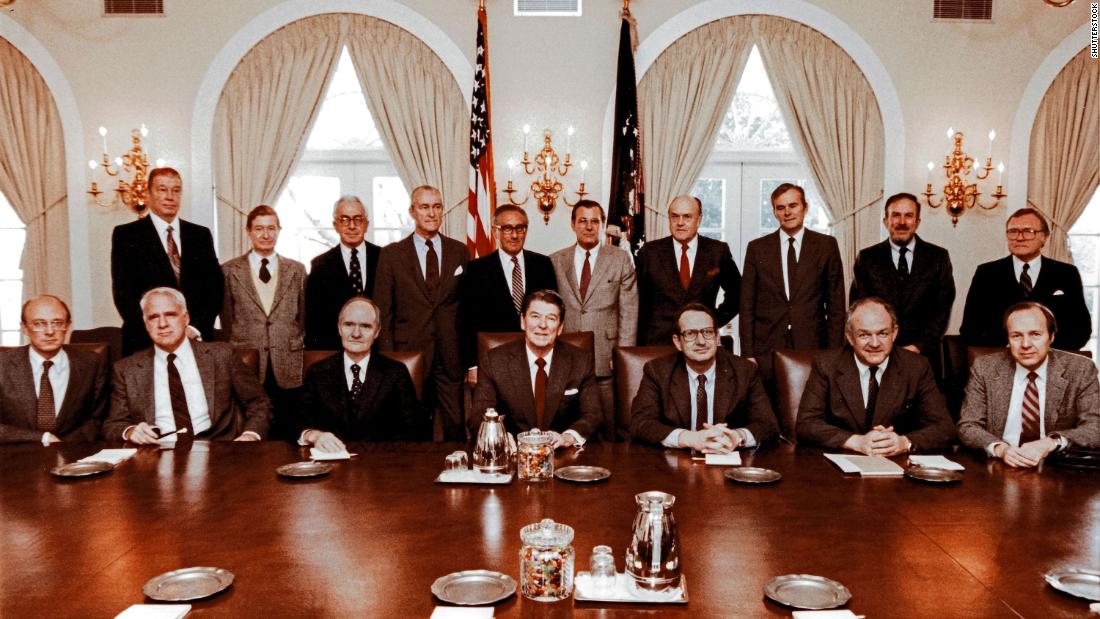 Rumsfeld, standing at center in the light-gray suit, poses with President Ronald Reagan, the President&#39;s Commission on Strategic Forces and the special counselors to the commission in 1983.