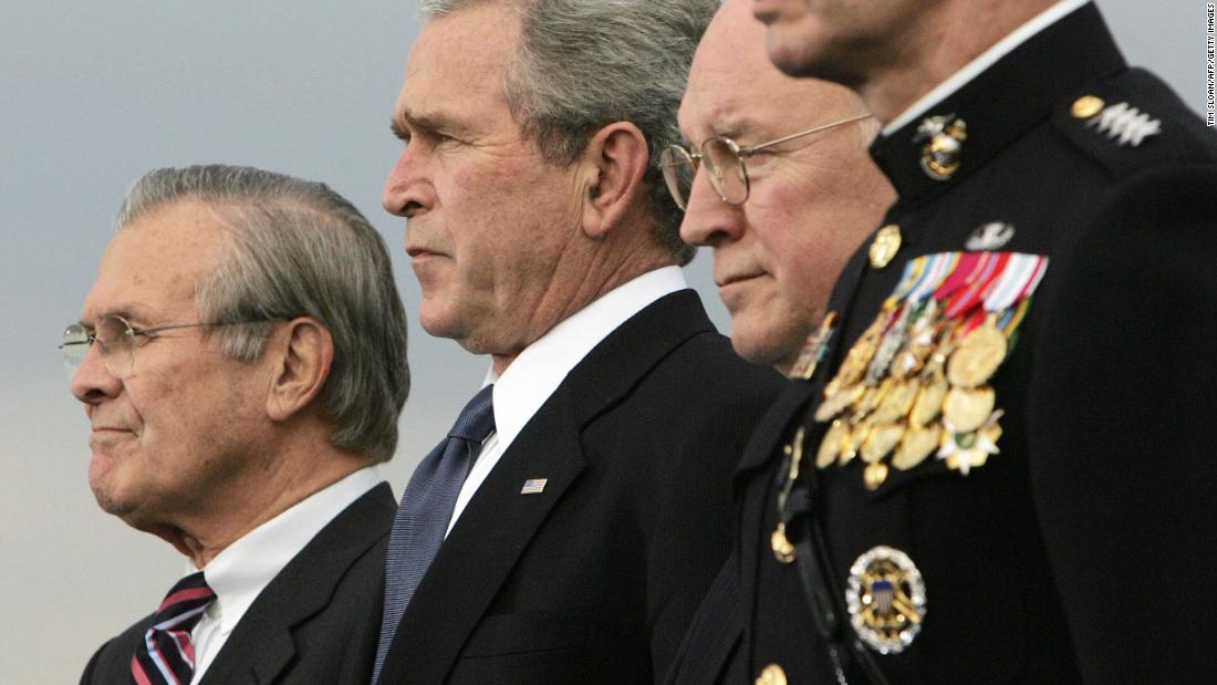 Rumsfeld, left, joins Bush, Cheney and Chairman of the Joint Chiefs of Staff Gen. Peter Pace for a Pentagon ceremony in December 2006. Bush was replacing Rumsfeld as secretary of defense.