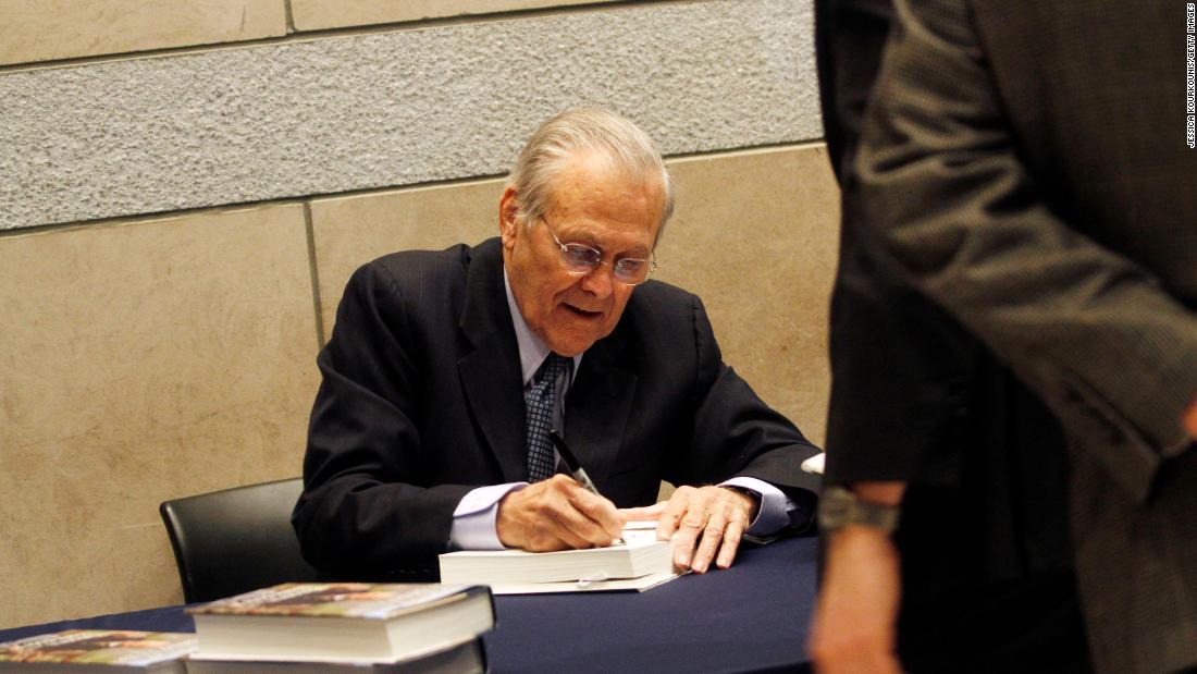 Rumsfeld signs books after speaking at the National Constitution Center in Philadelphia in 2011.