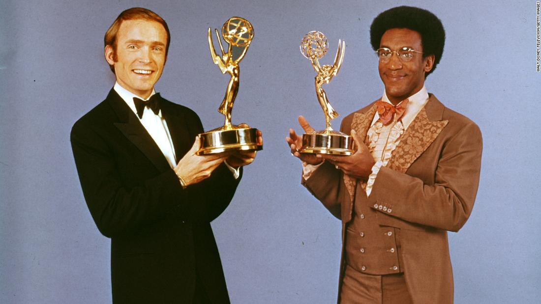 Cosby and Dick Cavett pose with Primetime Emmy Awards they won in June 1970. Cosby won the Emmy for his special that aired in 1969.