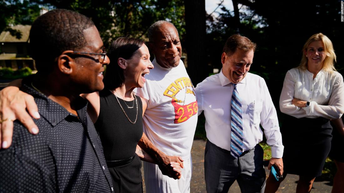 Cosby and members of his team speak to the media outside his home in Elkins Park, Pennsylvania, after his conviction was overturned and he was released from prison in June 2021.