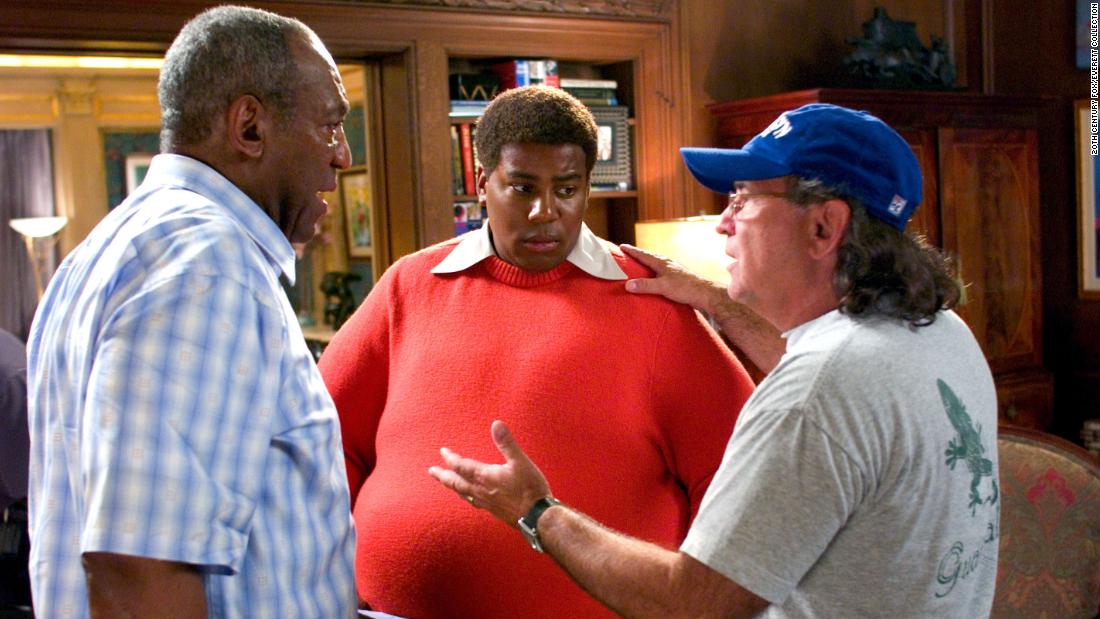 Cosby appears on the set of the film &quot;Fat Albert&quot; with actor Kenan Thompson, center, and director Joel Zwick in 2004. The movie was the live-action version of &quot;Fat Albert and the Cosby Kids,&quot; a Saturday morning cartoon series that Cosby created in 1972 and ran for more than a decade.