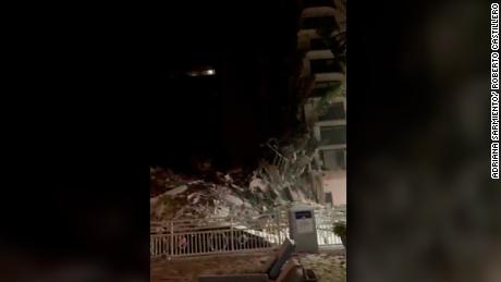 Video shows fallen debris and gushing water in the Surfside condo garage moments before collapse