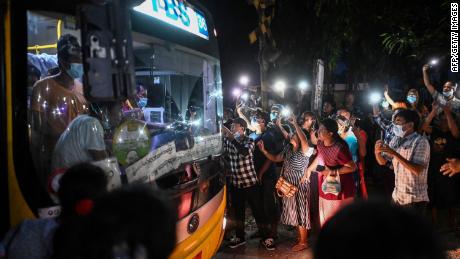 Relatives greet their loved ones who were released from the Insein prison in Yangon on June 30, following a surge in arrests of protesters since the February military coup. 