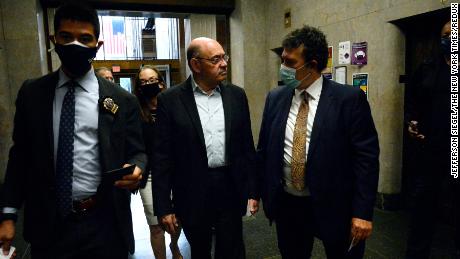 Allen Weisselberg, center, CFO of the Trump Organization, surrendered on Thursday to the Manhattan district attorney's office, in New York, on July 1, 2021. (Jefferson Siegel for The New York Times)