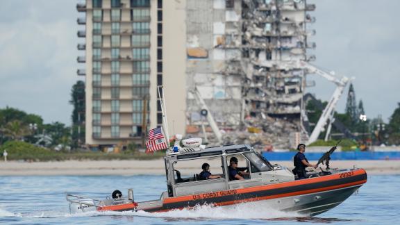 A Coast Guard boat patrols the water ahead of Biden's visit on Thursday.