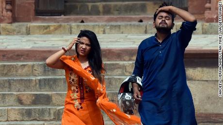 Visitors visit Humayun's Cemetery in New Delhi, India on a hot day on June 30 amid a heat wave.  