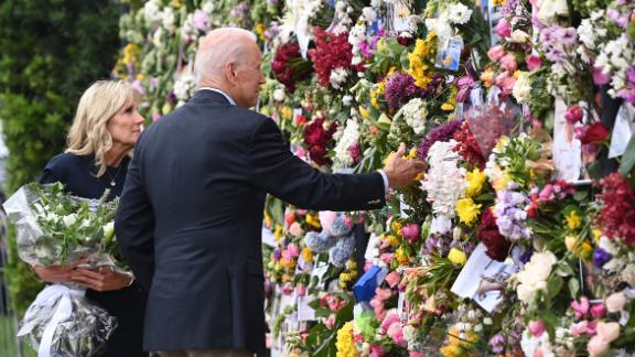 President Joe Biden and first lady Jill Biden visit a memorial near the partially collapsed building on Thursday, July 1. <a href="https://www.cnn.com/2021/07/01/politics/joe-biden-south-florida-visit/index.html" target="_blank">Biden traveled to Surfside</a> to console families still waiting on news of their loved ones. Those meetings were closed to the press.