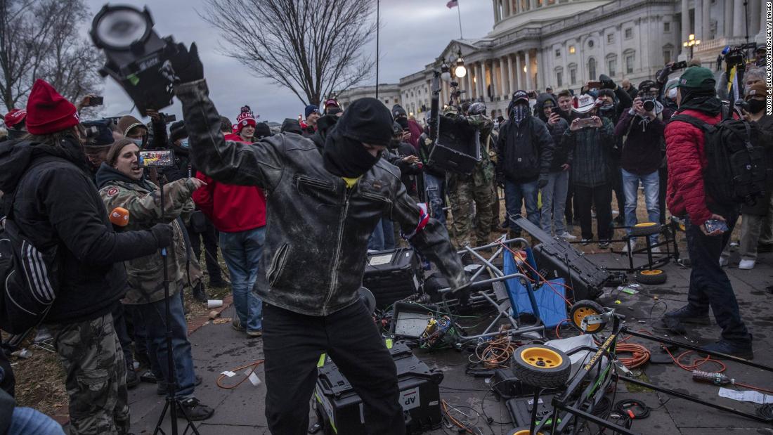 Capitol rioters smashing media equipment prompt several new criminal cases