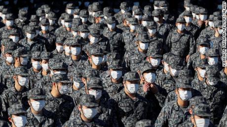 Japan&#39;s Air Self-Defense Force personnel prepare for a review by Japanese Prime Minister Yoshihide Suga at Iruma Air Base in Sayama, Saitama Prefecture, Japan on November 28, 2020. 