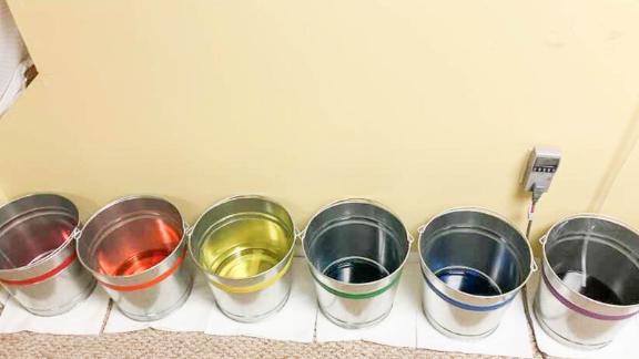 To keep track of each humidifier's output during our pump hose test, we used colored powdered dye.