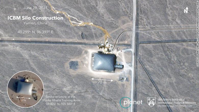 A likely single Chinese missile silo with a construction dome over the top.