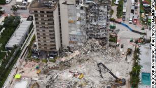 Rescue efforts at Florida condo building challenged by threats of collapse and a looming hurricane