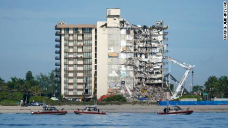 Search and rescue efforts at collapsed Surfside condo paused for demolition preparation