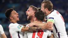 Jordan Henderson celebrates with Jadon Sancho, Mason Mount and Harry Kane after scoring England's fourth goal.