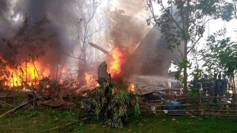 The burning wreck of a Philippine military plane that crashed in Jolo, Sulu province on July 4, 2021.