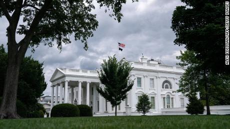 The White House is seen on July 3, 2021 in Washington, DC. - Washington, DC prepares to host the annual Independence Day fireworks display on the National Mall on July 4 as the country recovers from the COVID-19 pandemic 