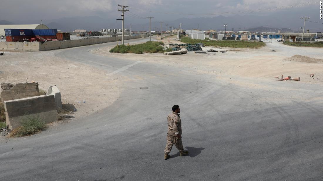 A member of Afghanistan's security forces walks at Bagram Air Base after the last American troops &lt;a href=&quot;https://www.cnn.com/2021/07/01/politics/us-military-bagram-airfield-afghanistan/index.html&quot; target=&quot;_blank&quot;&gt;departed the compound&lt;/a&gt; in July 2021. It marked the end of the American presence at a sprawling compound that became the center of military power in Afghanistan.