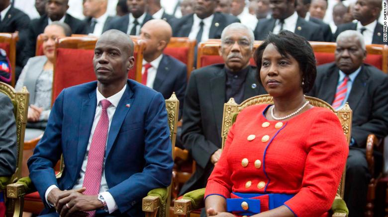 Moise sits with his wife Martine during his swearing-in ceremony in Port-au-Prince, Haiti, on February 7, 2017.