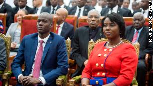 Moise sits with his wife Martine during his swearing-in ceremony in Port-au-Prince, Haiti, on February 7, 2017.