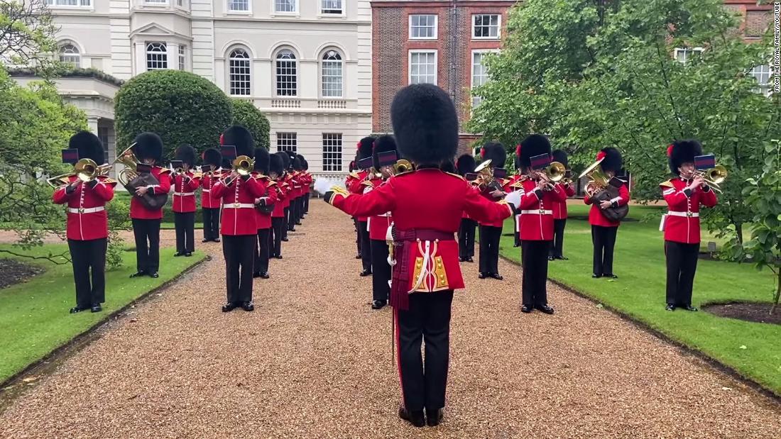 Coldstream Guards play England football anthems on Prince Charles' lawn