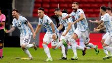 Argentina's players celebrate after the penalty shootout.