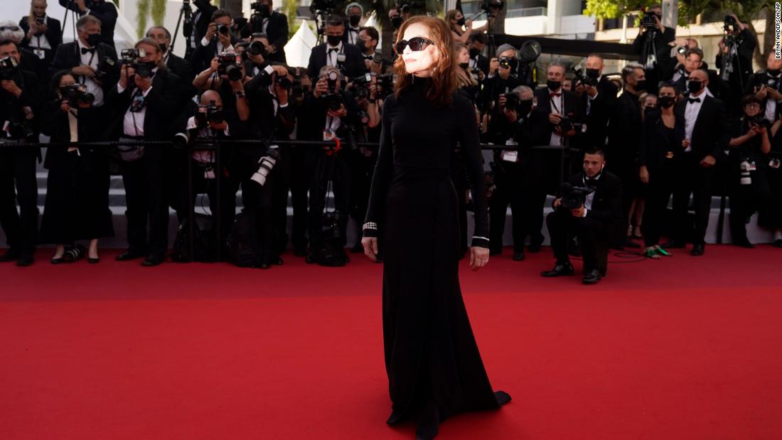French actress Isabelle Huppert donned a slick, high-neck Balenciaga dress topped off with Chopard jewels.