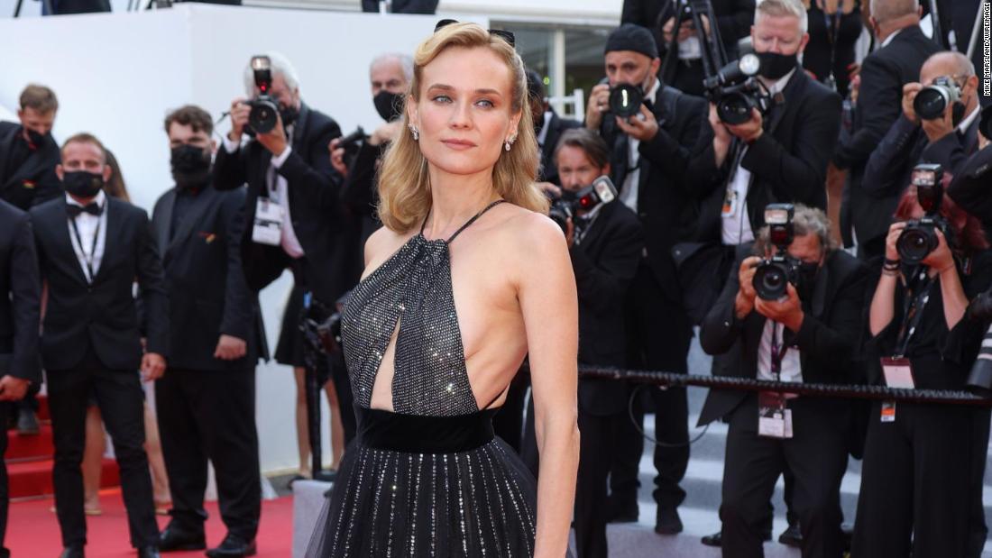 Actress and model Diane Kruger wore a black sparkling Giorgio Armani gown.