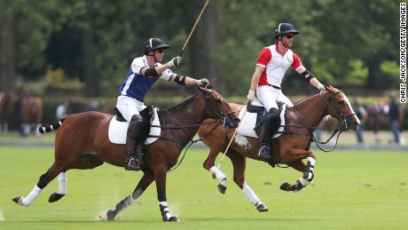 William and Harry compete in a charity polo event in 2019. 