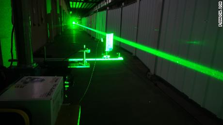 The one-year pandemic delay let the team run more tests of the laser in a lab in Paris, pictured here.