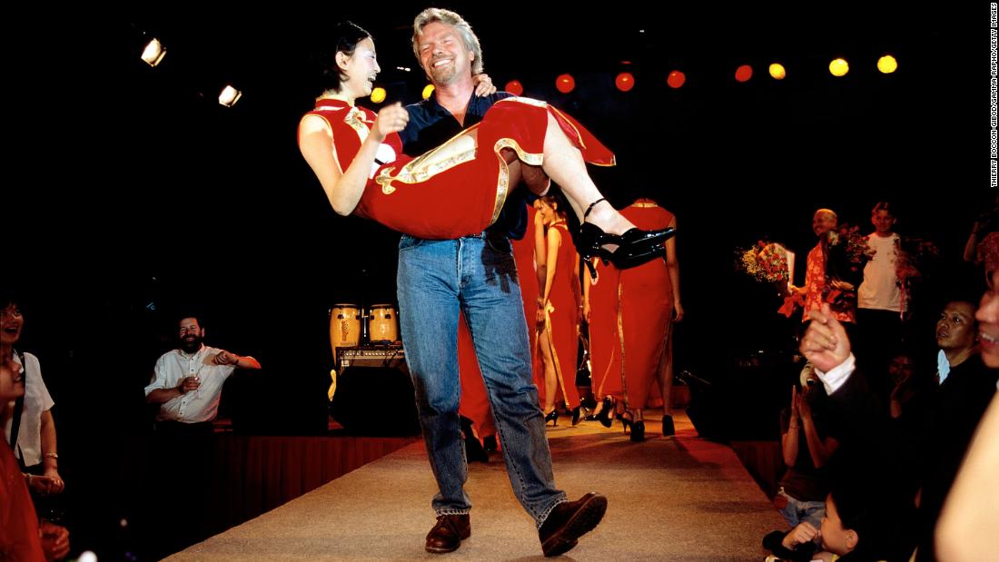 In 1999, Branson celebrates Virgin Atlantic&#39;s inaugural flight to Shanghai, China.