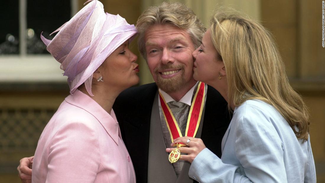 Branson is kissed by his wife, Joan, and his daughter Holly after he was knighted in 2000 for his &quot;service to entrepreneurship.&quot;