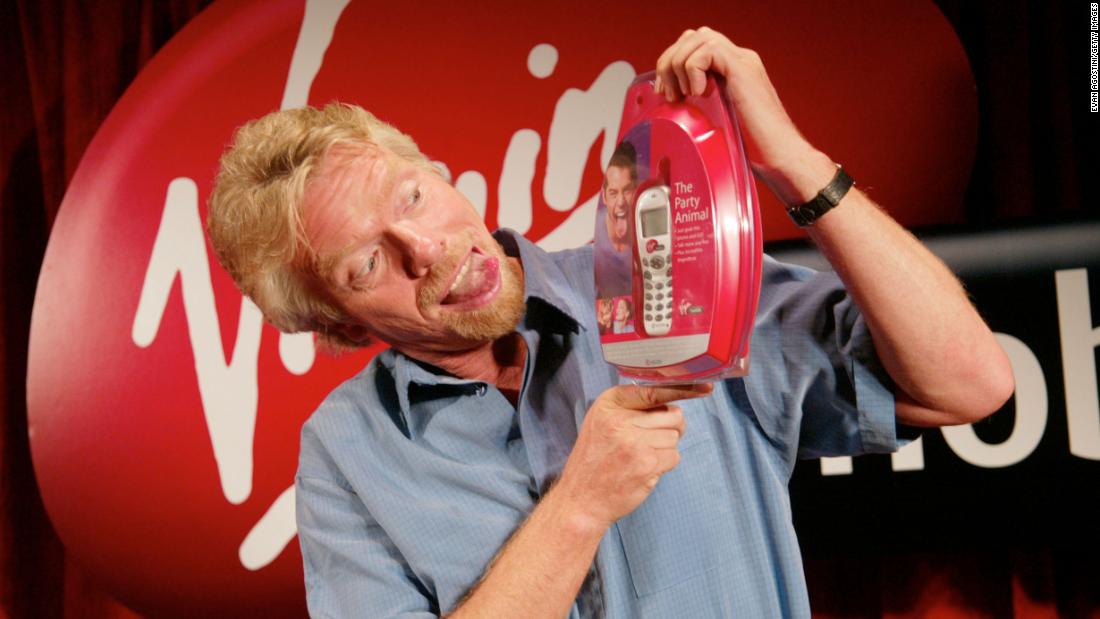 Branson launches Virgin Mobile USA, a cellular phone service, at New York&#39;s Times Square in 2002.