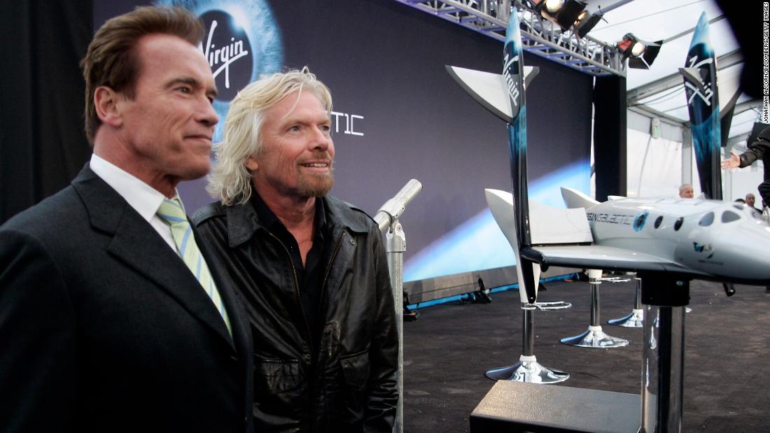 Branson and California Gov. Arnold Schwarzenegger address the media as Virgin Galactic unveiled a commercial spacecraft designed to send passengers into orbit for $200,000 a ticket.