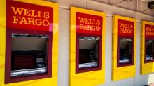 FOSTER CITY, CALIFORNIA / USA - December 14, 2019: The logo of Wells Fargo Bank in office building in San Francisco Bay Area. An American multinational investment bank and financial services company.